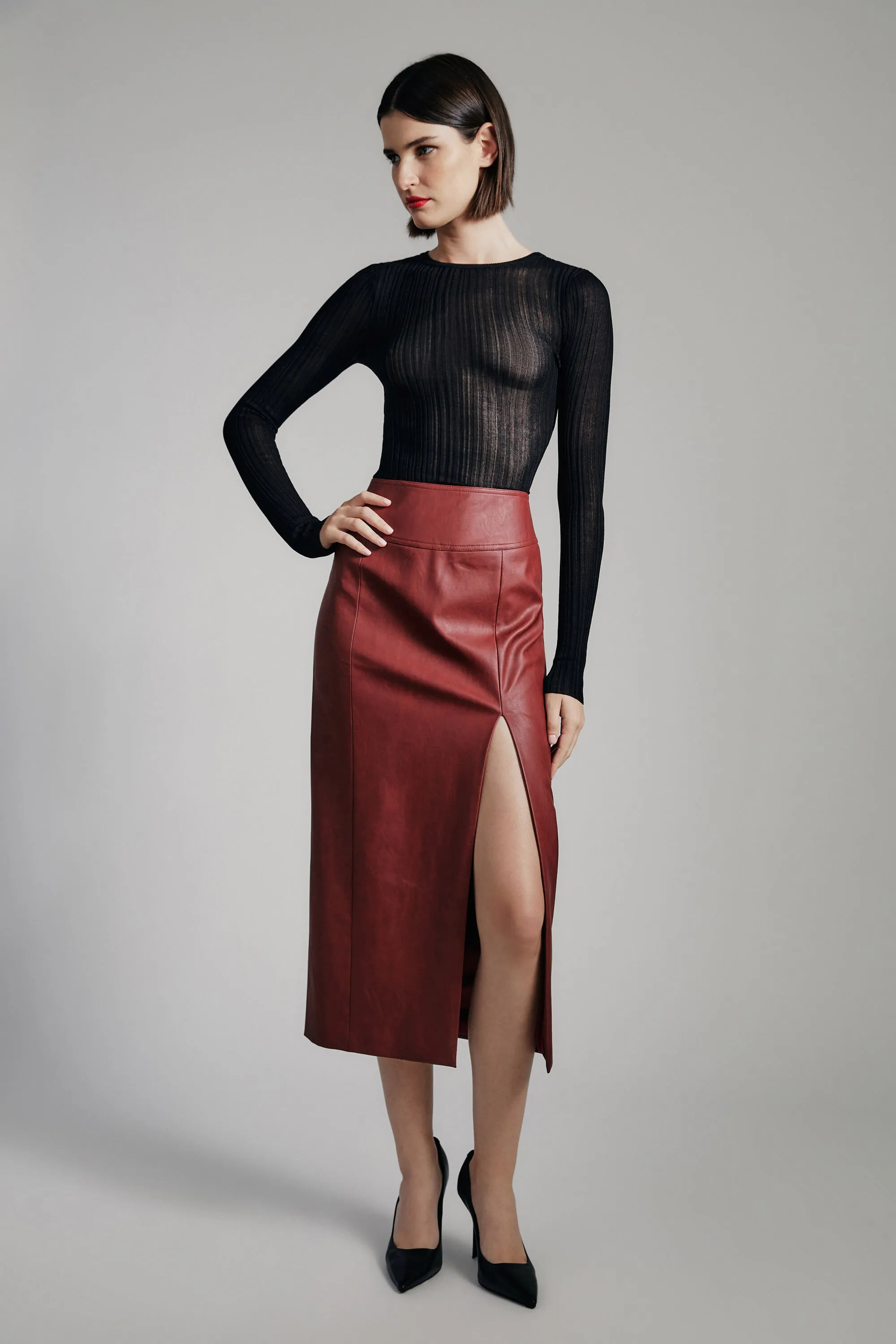 dante vegan leather midi skirt in deep red