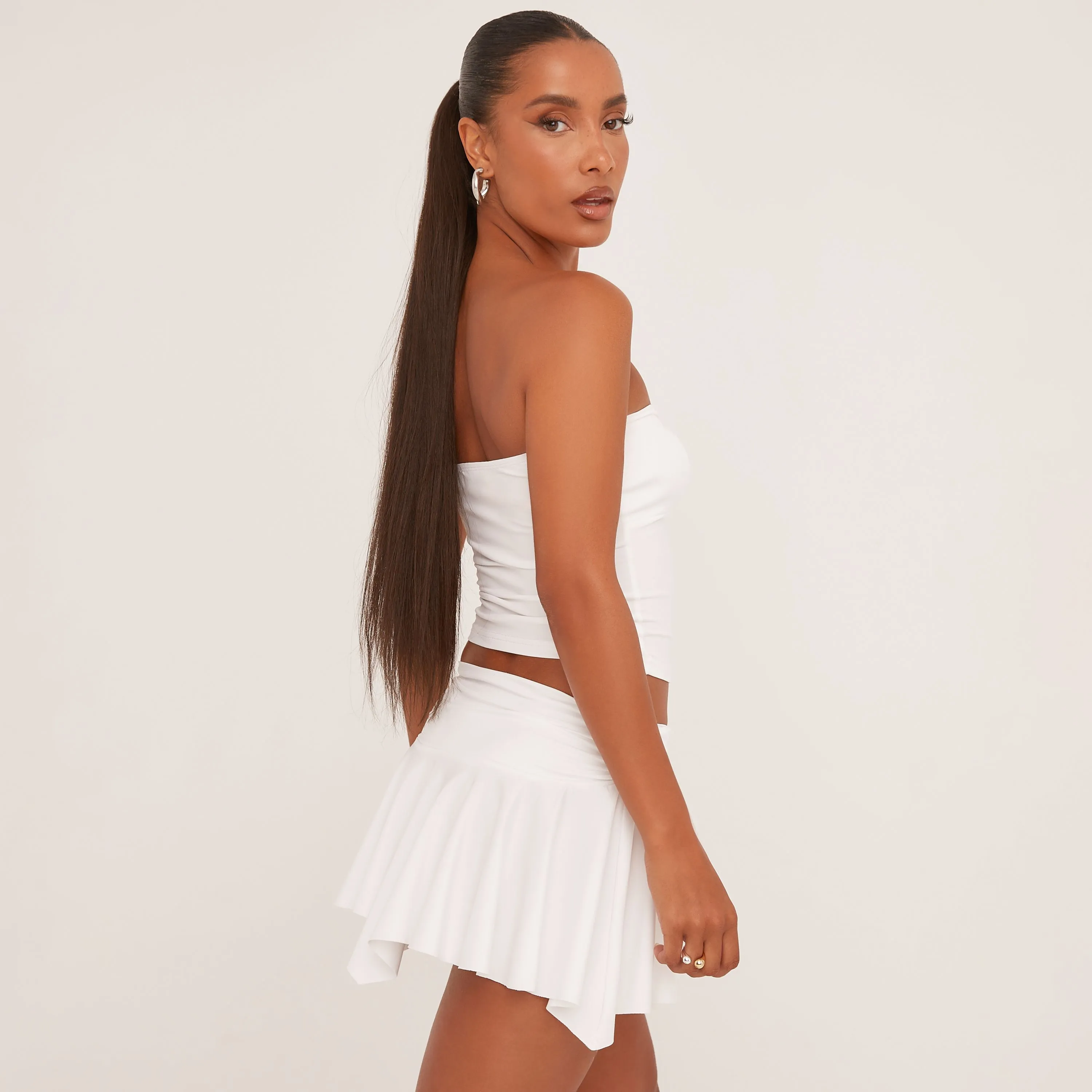 Gem Ring Detail Bandeau Top And Pleated Mini Skirt Co-Ord Set In Cream Slinky