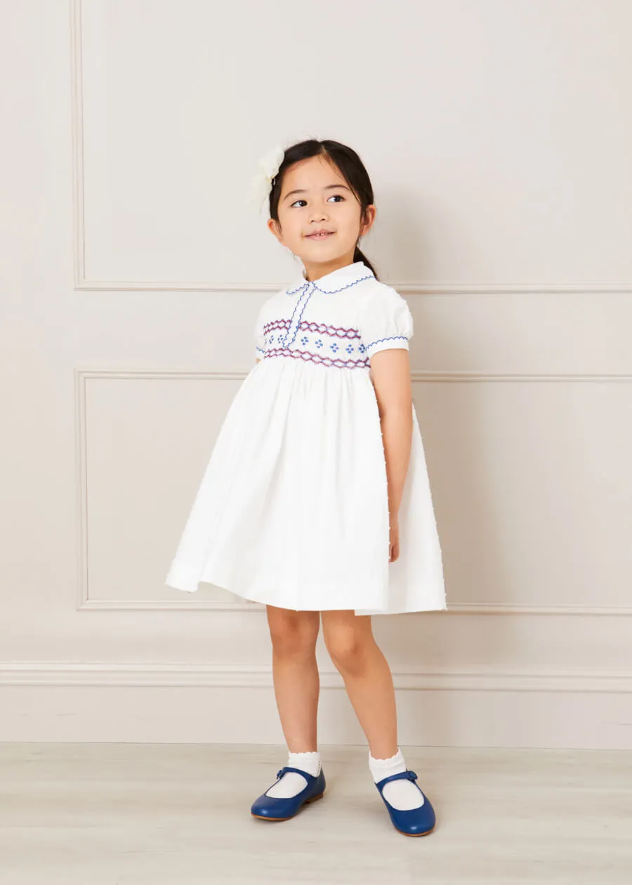 Handsmocked Plumetti Short Sleeve Dress in White (12mths-6yrs)